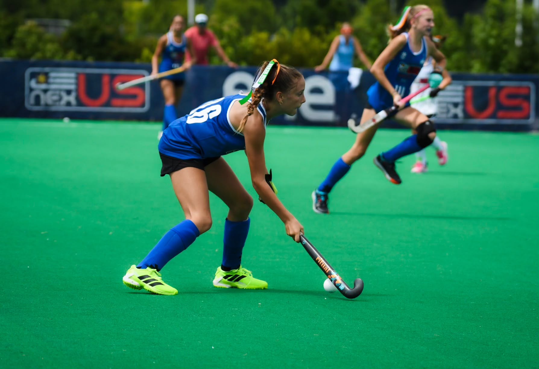 Miah Meccage controlling the ball during a field hockey game